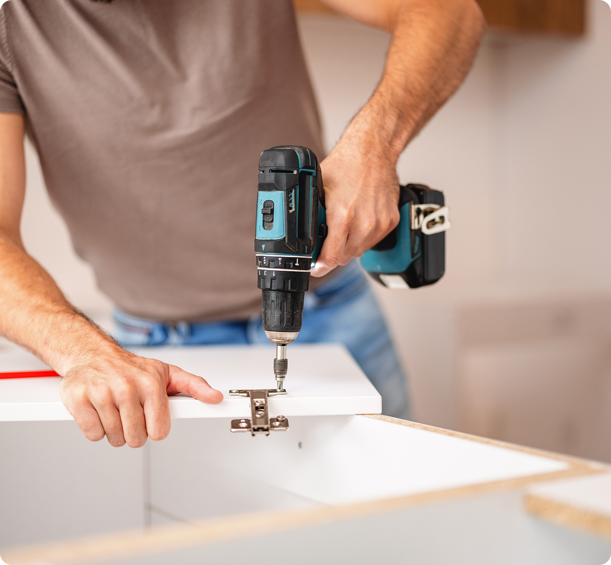 Installing cabinet hinge with a drill
